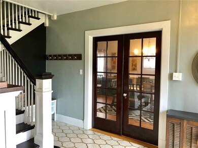 Foyer with French Doors to Dining Room