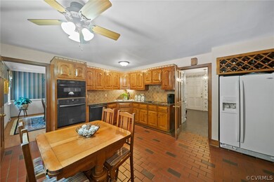 The Eat-in Kitchen boasts Tile Flooring, Raised Pa