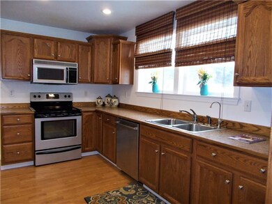Kitchen. Oak cabinets with brushed nickel hardware