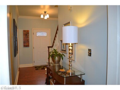 Entry. The charming foyer welcomes your guests!