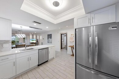Kitchen featuring stainless steel appliances, whit