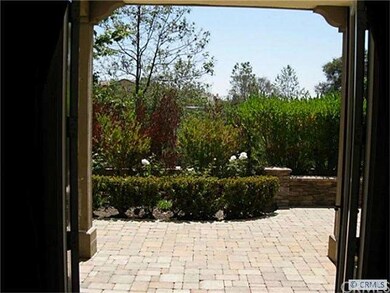 French doors off kitchen area lead to outside