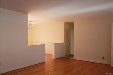 GORGEOUS hardwood floors in the living room and di