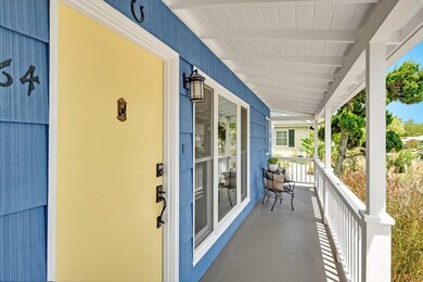 The quintessential front porch - awaiting your mor