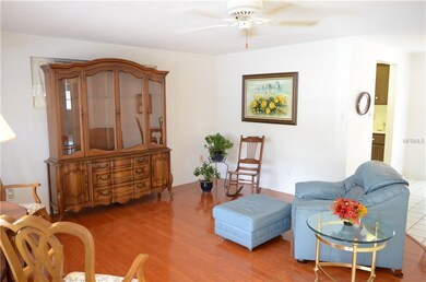 Large family room with wood floors.