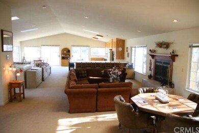 Main level gaming area, fireplace retreat, kitchen
