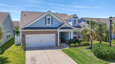 View of front of property with brick siding, concrete driveway, roof with shingles, and a front yard