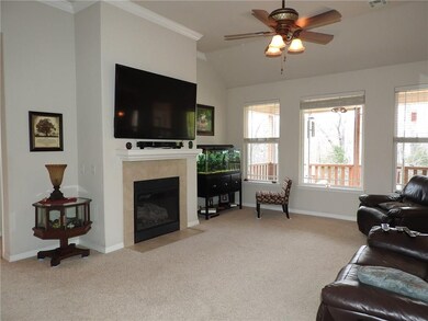 Lots of windows opening to the deck and common area behind. Very private.