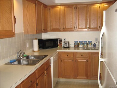 Fully applianced kitchen is efficient, and located
