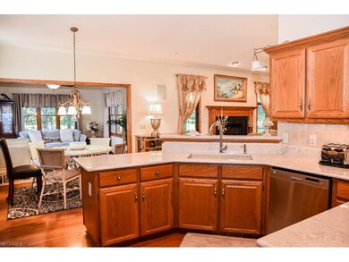 Kitchen has a dinette and is open to the sun room.