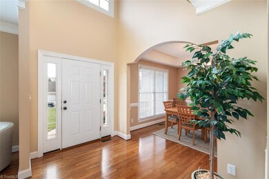 Bright entrance into Open Floor plan - Hardwood floors