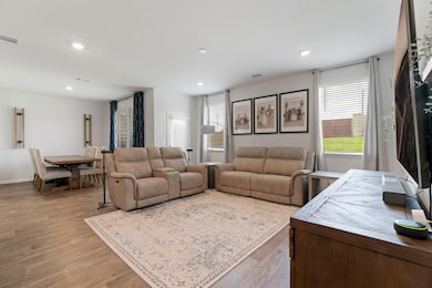 Living room featuring healthy amount of natural l