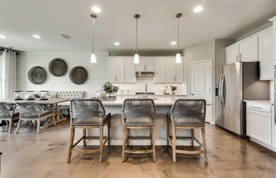 Eat-in bartop island *Photos of furnished model. N