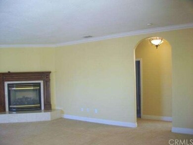 Family room w/fireplace.