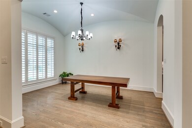 Spacious formal dining room with growing vault cei
