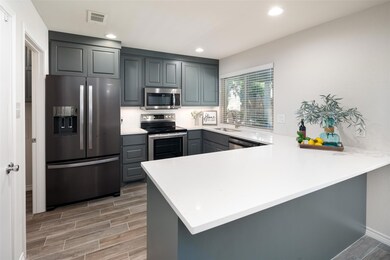 Spacious Kitchen with beautiful custom cabinets
