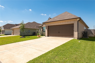 Ranch-style home with cooling unit, concrete drive