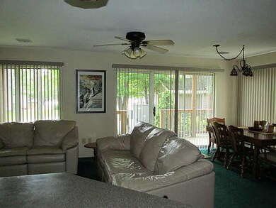 Living Room. Looking out to deck