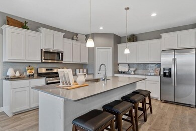 All Photos shown here may not depict the specified home & features included are for illustration purposes only.