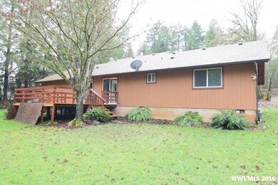 Deck leads to back yard.