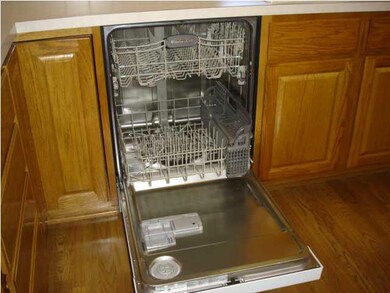 This nearly new dishwasher is stainless steel insi
