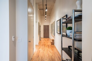 Impressive gallery wall as an entryway in this gor