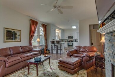 Another view of the Great Room showing its connection to the kitchen area. This is a  Perfect  set up for quick and easy trips to the kitchen.  