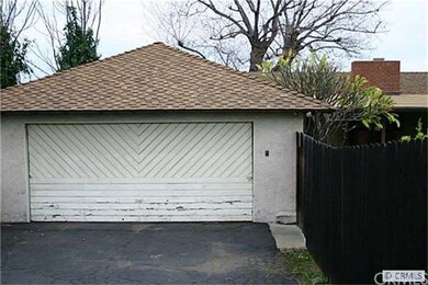 2 car garage with alley access.