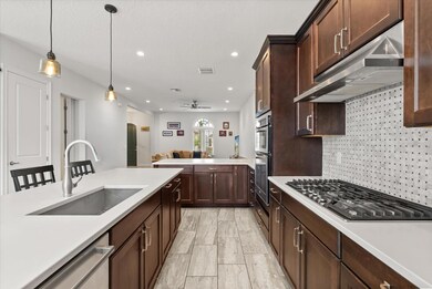 8915 Fountain Palm Aly, Winter Garden, FL 34787 - photo 5