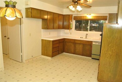 Kitchen has newer built in cook top and oven, tile