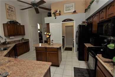 Spacious Kitchen Upgraded with Granite and Cherry 