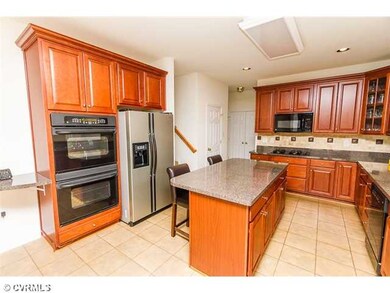 Kitchen - Double oven, island, gas cook top, custo