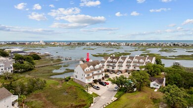 Aerial view of residential area with a nearby body of water