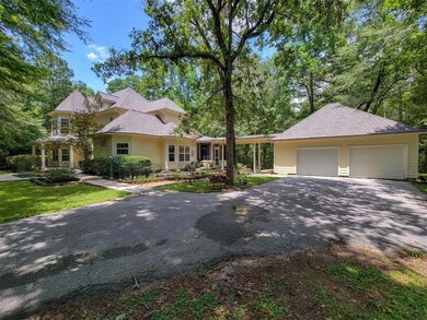 2 over sized 2 car garage with turn around area on driveway.