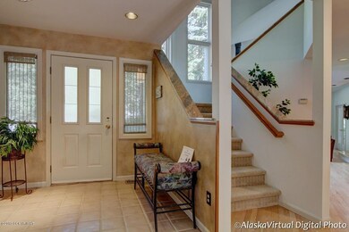 ENTRANCE W/TILE FLOORS & NATURAL LIGHT