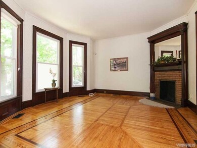 Living room/parlor with gorgeous inlaid floor