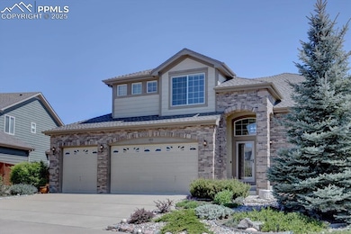 View of front of home with brick siding, concrete driveway, roof with shingles, and a garage
