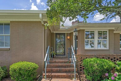 Property entrance with brick siding