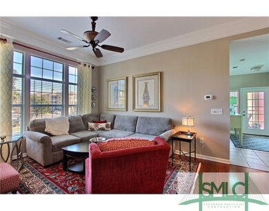 Living Room. Light filled space overlooks lagoon.