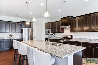 Large open concept kitchen with granite counters, 