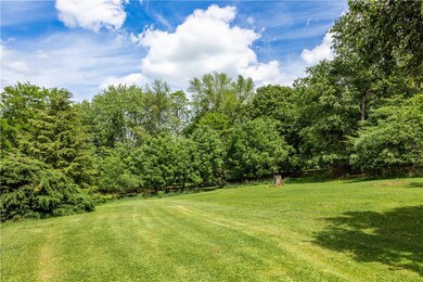 The home sits on 1.5 acres. Great yard for kids to