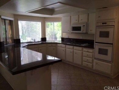 OPEN FLOOR PLAN KITCHEN WITH UPGRADED GRANITE