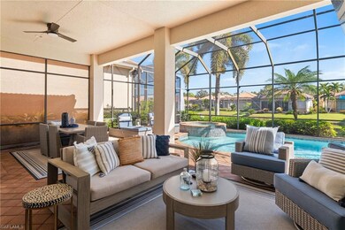 A backyard oasis includes multiple seating areas &