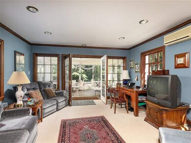 Large living room currently used as an office with