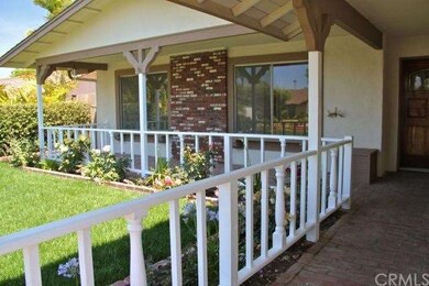 Great curb appeal with a brick front walk and cove