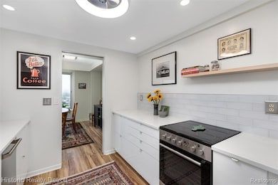 1300 E. Lafayette #2407 — Elevated City Living with Iconic Views.  Perched high on the 24th floor of Detroit’s iconic 1300 East Lafayette Cooperative, this 1,664 sqft corner residence embodies the best of modern city living. Recently reimagined with 