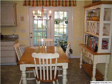 Eat in kitchen - has lots of room and french doors