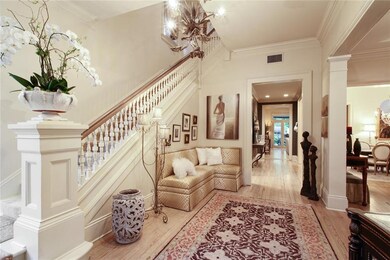 Beautiful Foyer with View to Rear Patio. Custom Ba