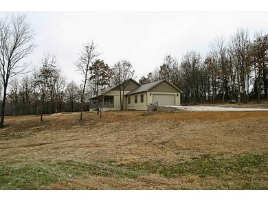 Exterior Front. Country home with nice yard, sits on 5 acres.