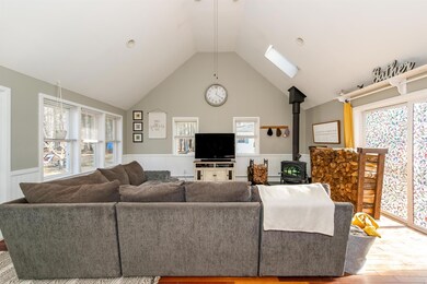Wood stove included, 2 skylights, slider right ont